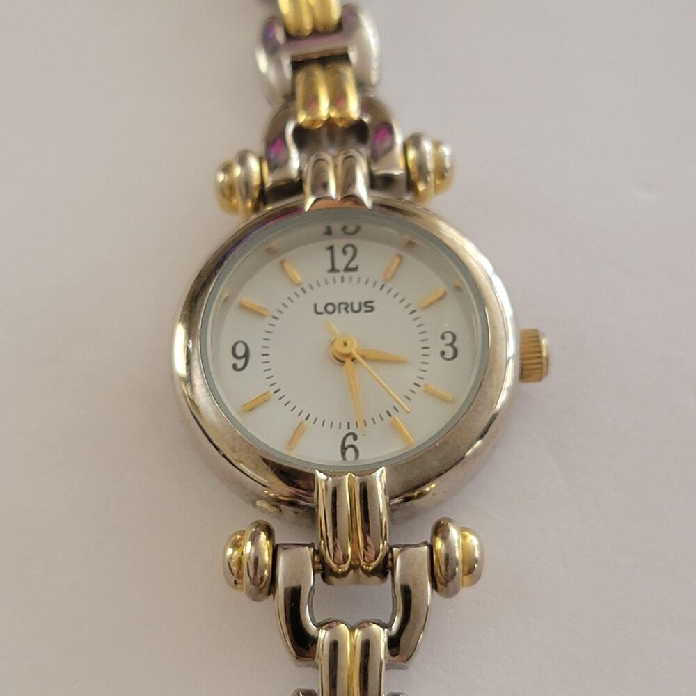 Lorus Womens Watch 24mm White Dial Silver Case Multicolor Bracelet Quartz L428